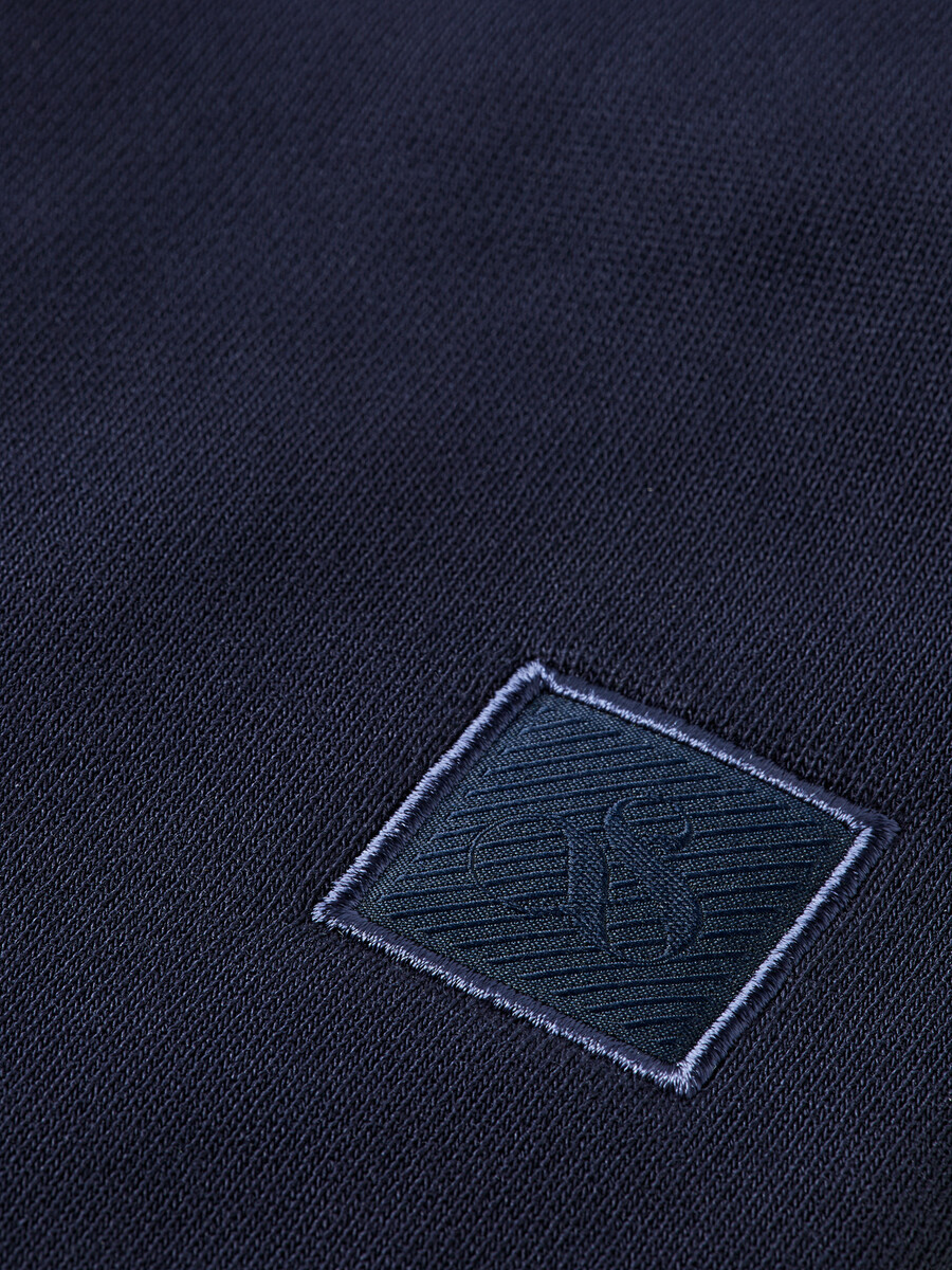 pantalones cortos deportivos con insignia y logotipo para niños