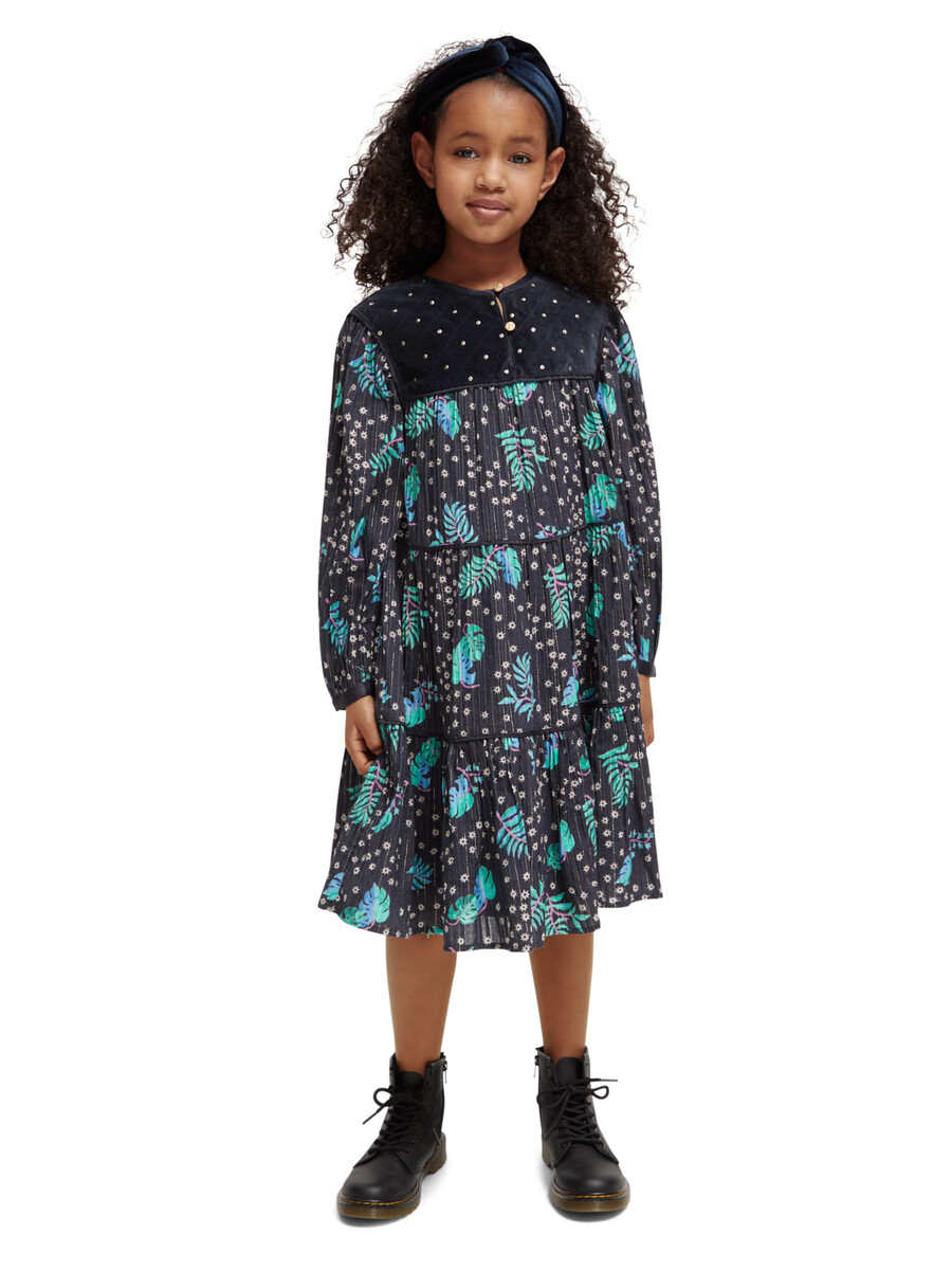 vestido de niña con detalle de terciopelo estampado por todas partes
