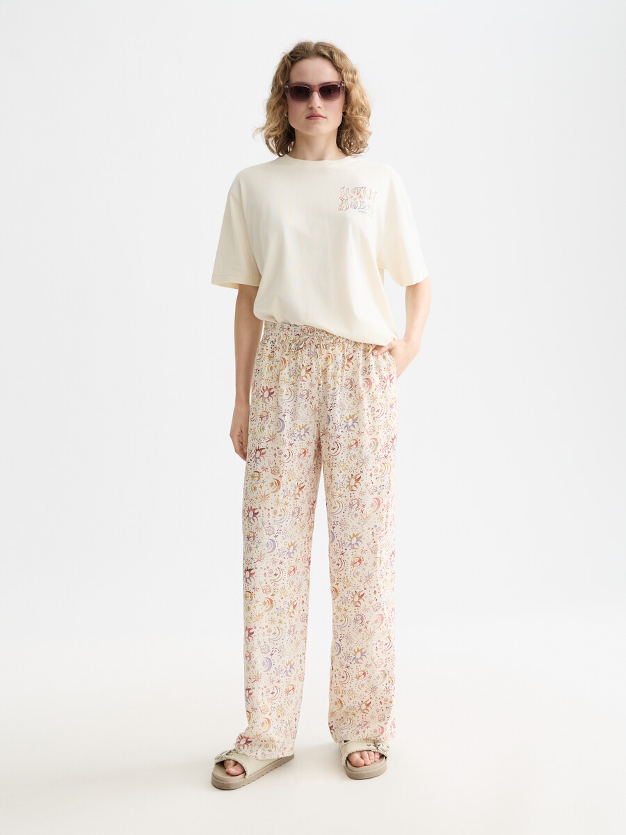 gia - pantalones de tiro medio con pernera ancha y estampado integral