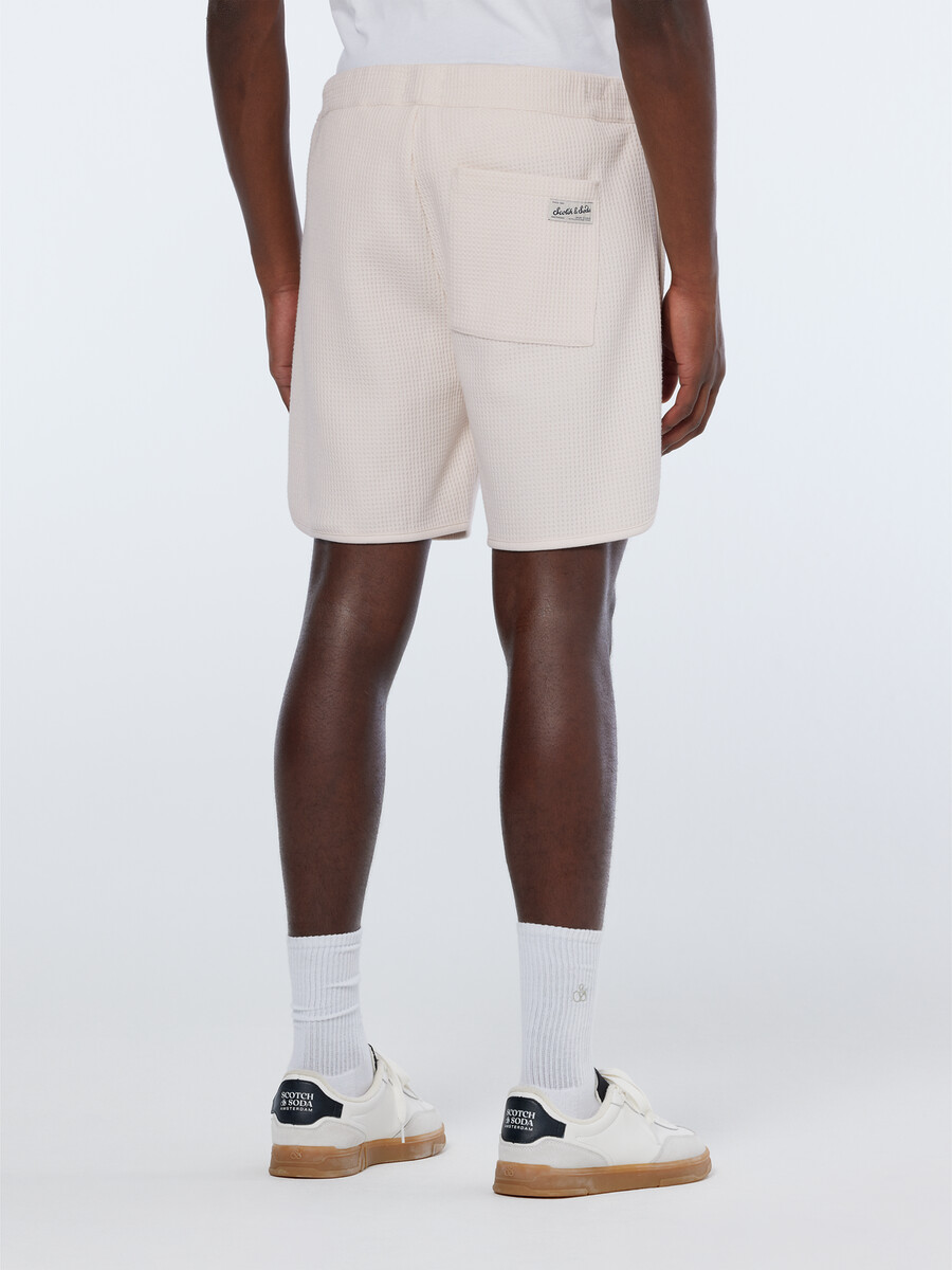 bermudas deportivas de corte relajado con diseño de gofre