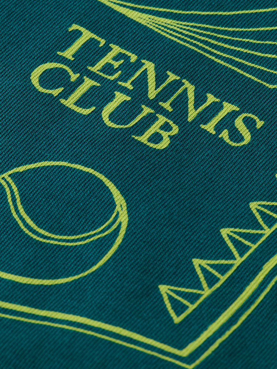 camiseta holgada con ilustraciones del club de tenis