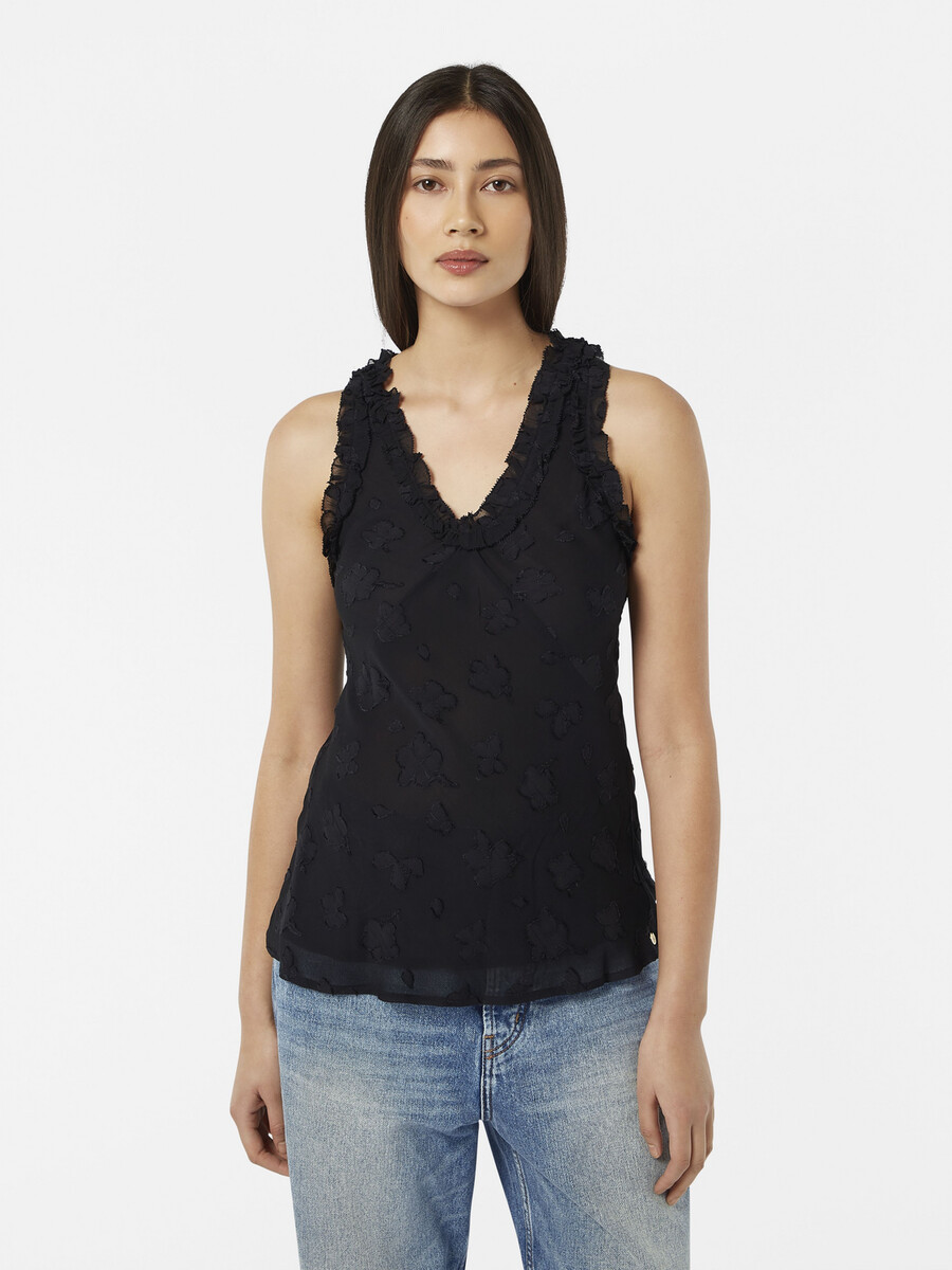 camiseta sin mangas con volantes