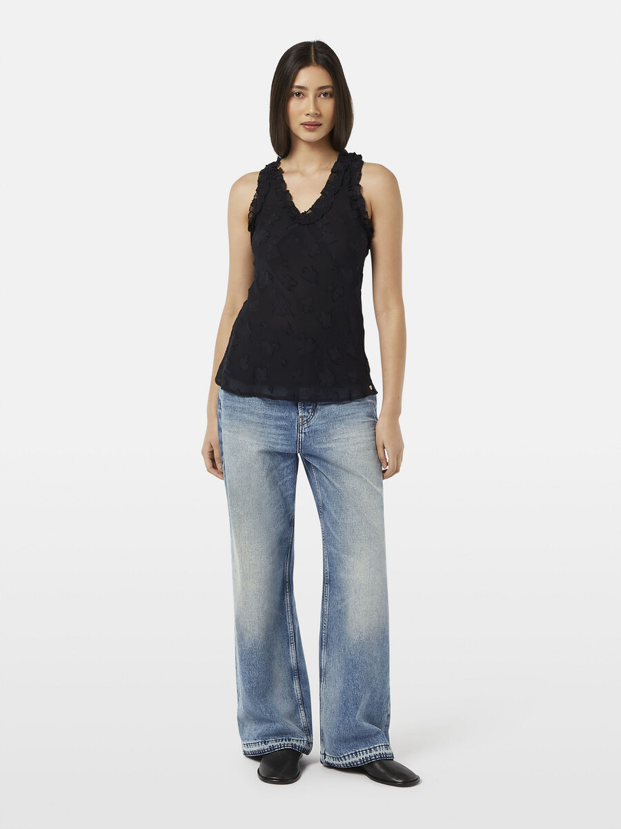 camiseta sin mangas con volantes